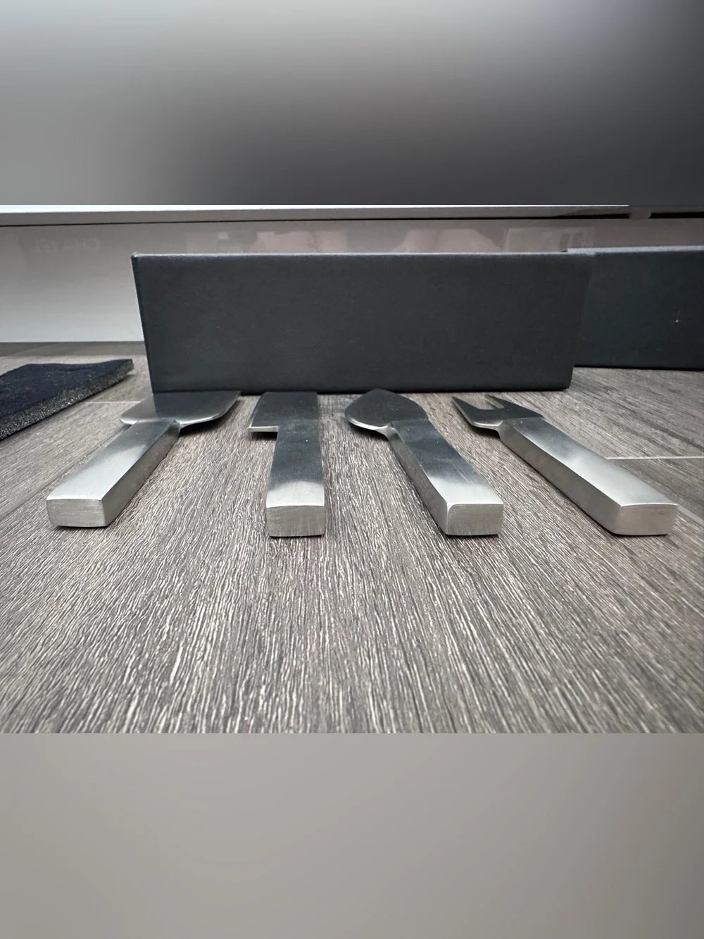 Calvin Klein stainless steel cheese serving set by Calvin Klein Home collection.